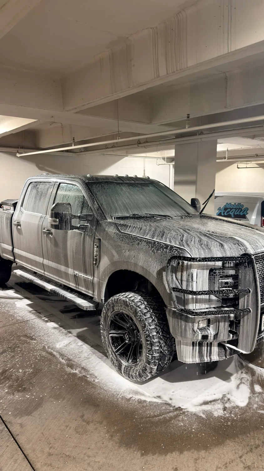Express exterior hand wash with foam bath at Acqua Car Wash in Dallas