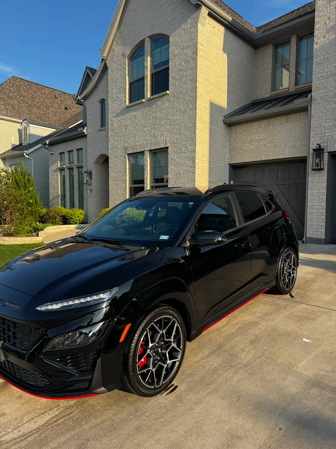 Black Hyundai Kona N detailed at a customer's home in Dallas