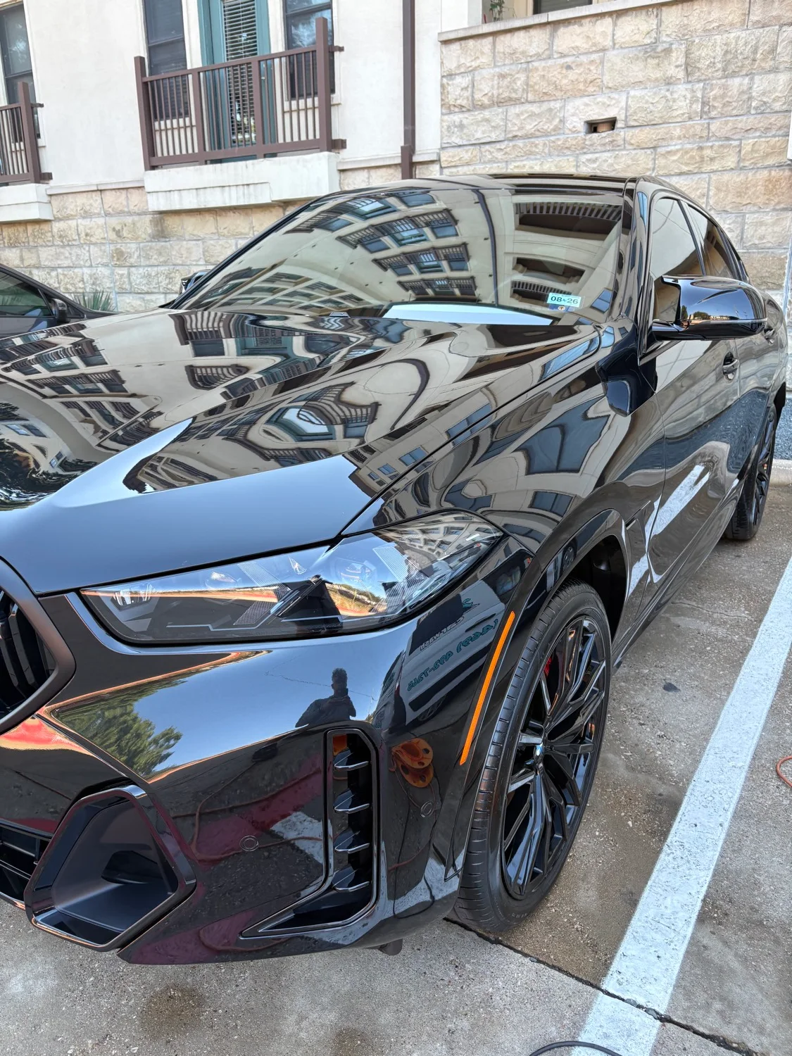 Glossy ceramic coating paint protection applied to a car in Dallas