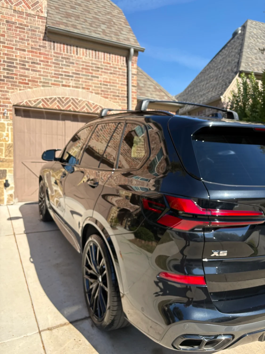 Black BMW X5 detailed and protected by Acqua Car Wash in Dallas